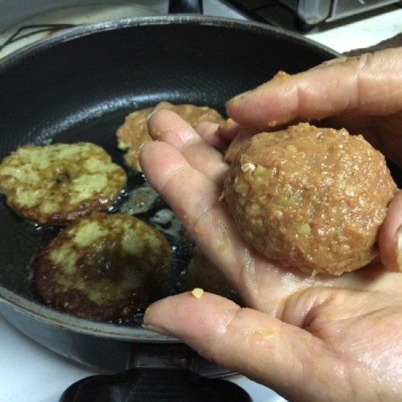 hand with ball of mixed ingredients