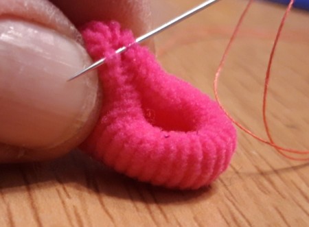 Teeny Tiny Dolly Slippers - pinch one end of the ponytail band and stitch in place