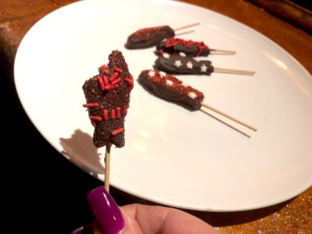 Chocolate Covered Swedish Fish with a bite out of it