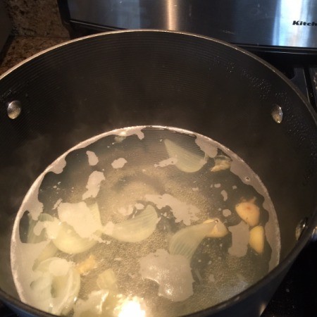 boiling water with garlic