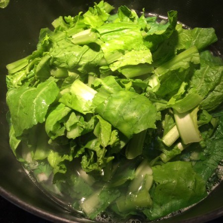 adding Mustard Greens to  Shrimp Soup