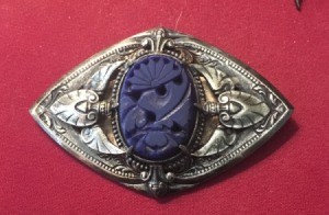 Determining If a Brooch Is Silver - beautiful silver pin with an oval cast or carved purple center insert