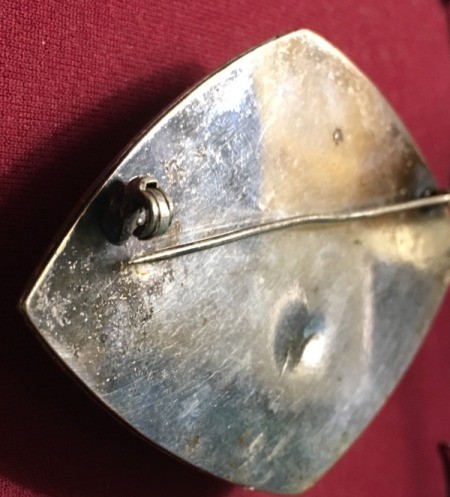 Determining If a Brooch Is Silver