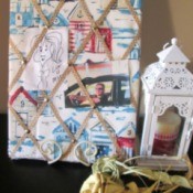 Making A Memory Board From Packing Materials - board in holder on mantel