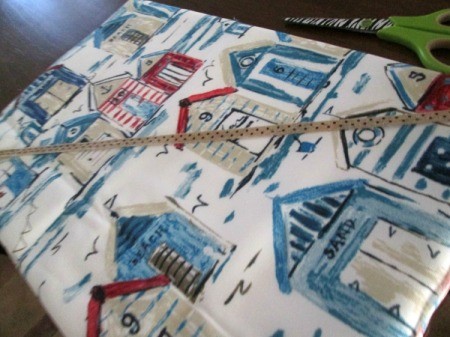 Making A Memory Board From Packing Materials - begin adding ribbon, diagonally, glueing to the back