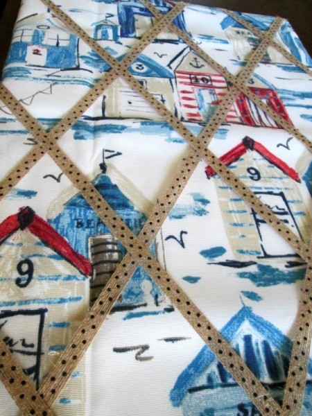 Making A Memory Board From Packing Materials - criss cross with ribbon starting on the other corner