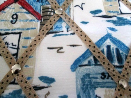 Making A Memory Board From Packing Materials - firmly place a tack where the ribbons cross