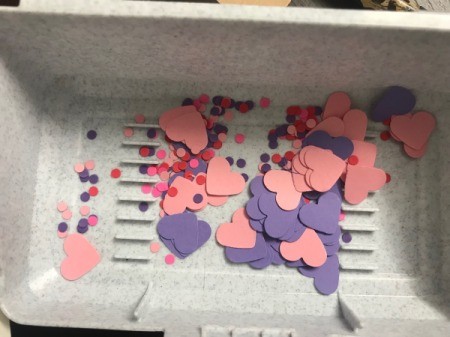 Repurpose Victoria's Secret Shopping Bag for Valentine's Day - container of pink and purple paper dots and hearts
