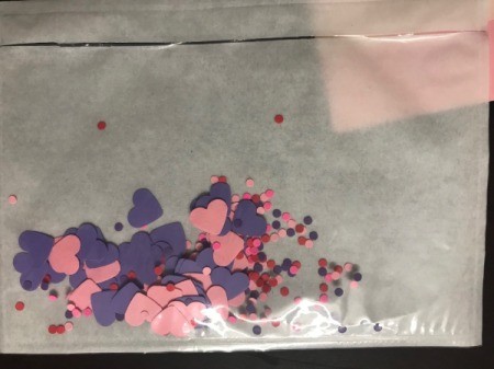 Repurpose Victoria's Secret Shopping Bag for Valentine's Day - add punched shapes to the bag