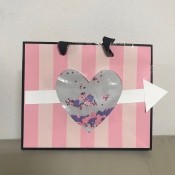 Repurpose Victoria's Secret Shopping Bag for Valentine's Day - cute pink and white striped shopping bag repurposed into a Valentine's Day gift bag