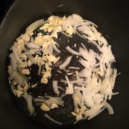 onions and garlic in pan