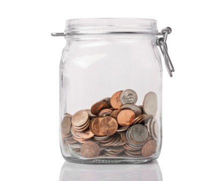 A jar of change being saved.