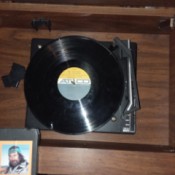 Value of a Capehart Stereo and 8 Track Player - turntable with record in place