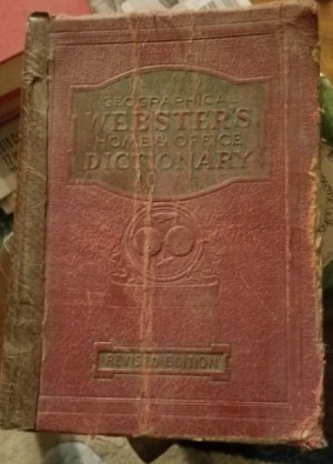 Value of a Geographical Webster's Home and Office Dictionary  - battered old dictionary cover
