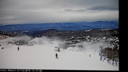 A Beech Mountain ski cam showing skiers on the mountain.