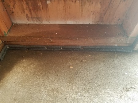 Foam To Fix a Leak in a Store Room - insulation up against the base of the wall