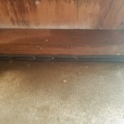 Foam To Fix a Leak in a Store Room - insulation up against the base of the wall