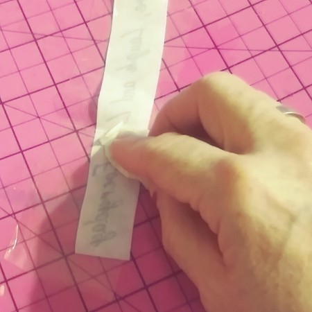 Transfer Labels with Clear Packing Tape - carefully apply the paper to the packing tape, printed side down