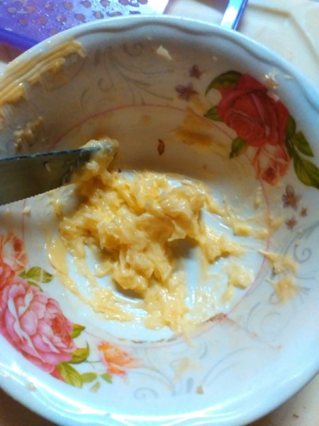 mixing garlic and butter