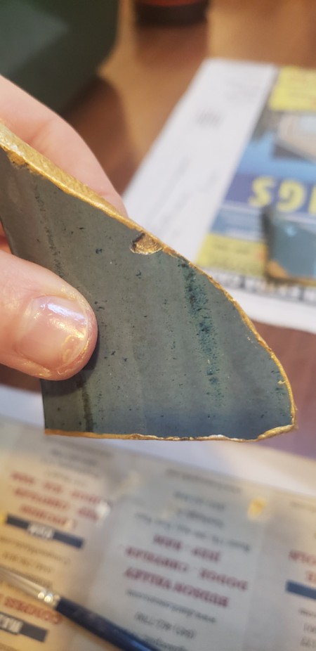 DIY Japanese Kintsugi Pottery Repair - paint showing right at the broken edge