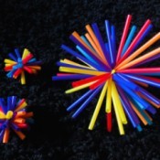 Drinking Straw Starbursts - finished starbursts against a black background