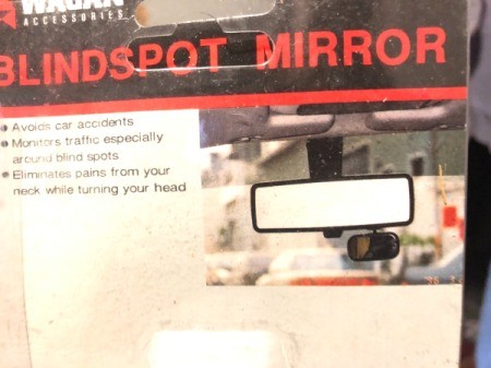 A blindspot mirror for reflecting toward the security camera.