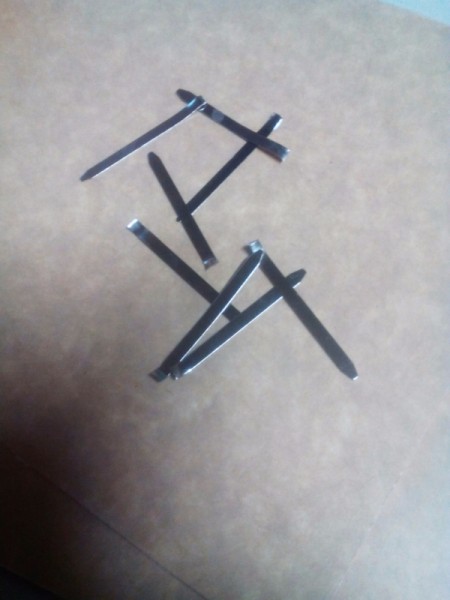 Handcrafted Notebook and Planner - detached parts of the fasteners