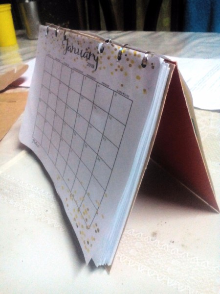 Handcrafted Notebook and Planner - side view with it open to a calendar page
