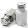 salt and pepper shakers on white background