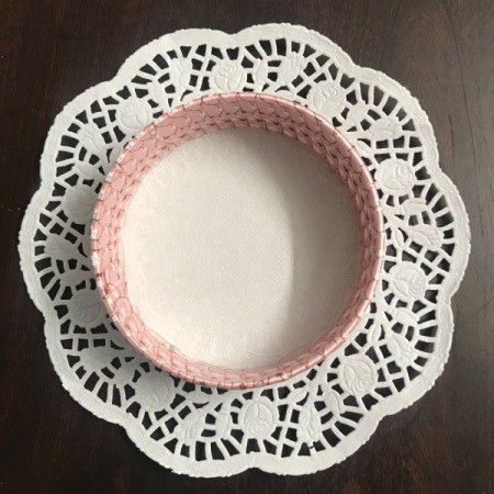Candy Basket - looking down on the ribbon wrapped roll glued to the doily