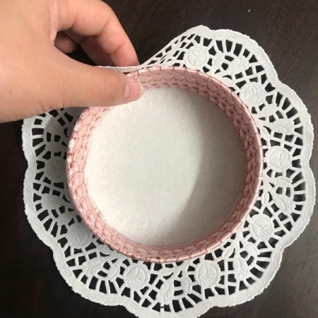 Candy Basket - dab some hot glue dots around the doily