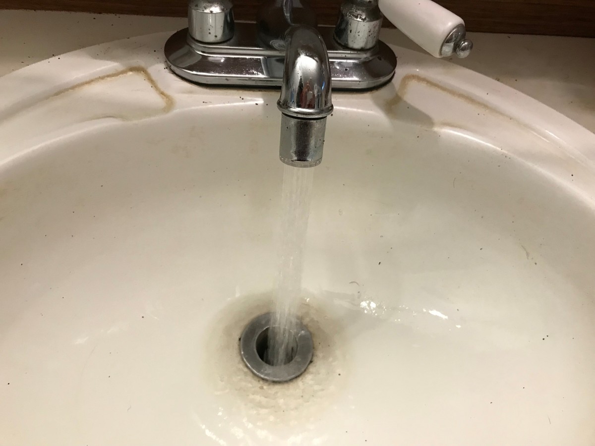 both sinks in bathroom clogged