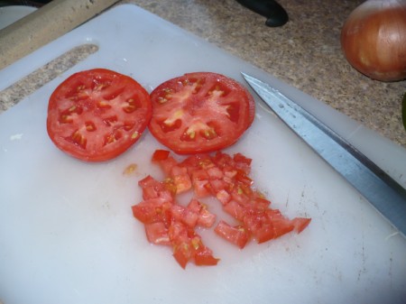 chopping tomato fine
