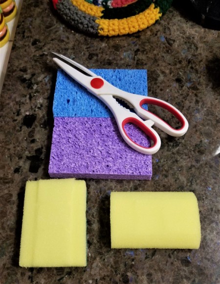 Cutting sponges to size.