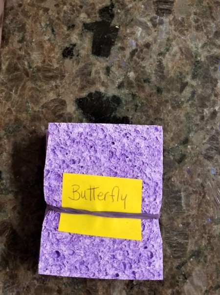 Labeling sponges with jewelry inside to help with finding it later.