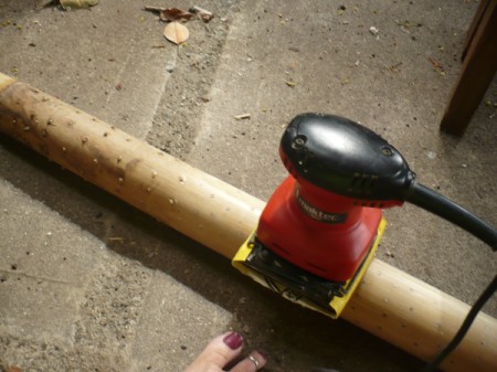 Making a Bamboo Rainstick - smooth sanded area of bamboo with more to sand to the left