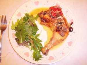 Easy Tuscan Chicken on plate with salad