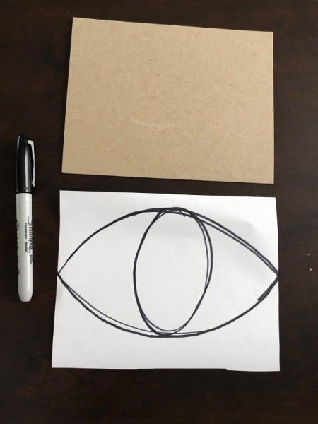 Eye Love You Valentine's Day Art Work - piece of white paper the same size with an eye sketched on it
