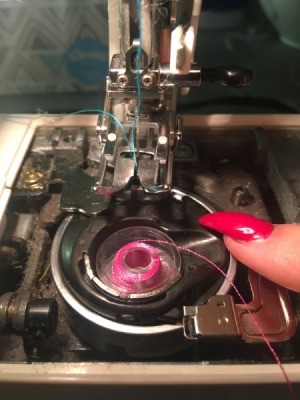 Sewing Machine Not Picking Up Bobbin Thread - closeup of needle and bobbin area