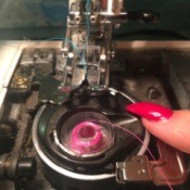 Sewing Machine Not Picking Up Bobbin Thread - closeup of needle and bobbin area