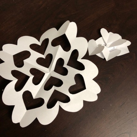 Valentine's Day Decorated Gift Bag - finished design with small heart cut outs next to it