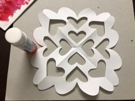 Valentine's Day Decorated Gift Bag - paper heart snowflake and glue stick