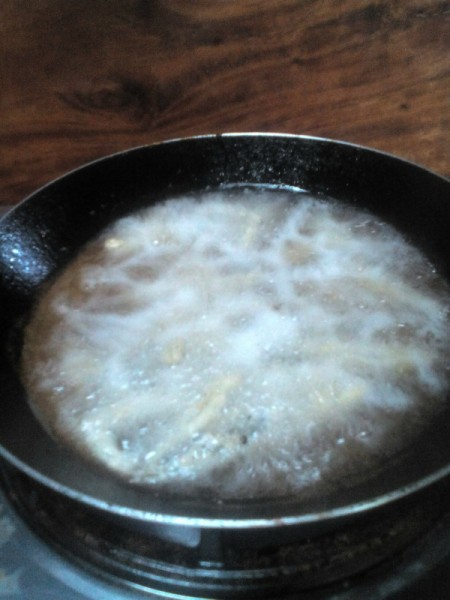 frying coated anchovies
