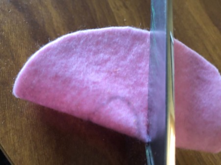 Donut Coasters - fold the felt circle in half and cut out around the circle making it slightly larger