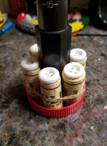 Support a Ring Mandrel with Corks - find a lid to place the corks in, glue if needed