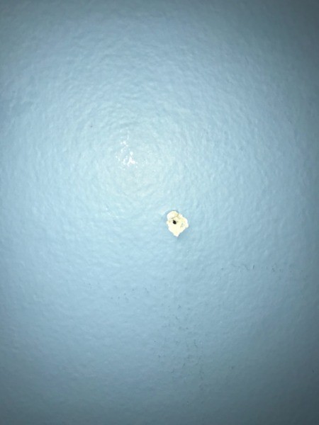 Patching Screw Holes in Walls - hole where screw was