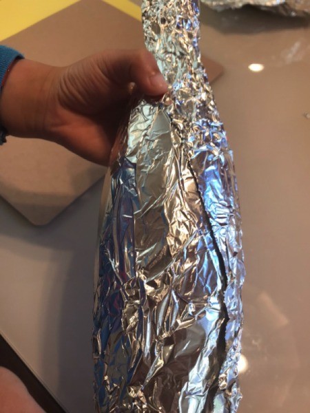 Making a Recycled Rocketship - wrap foil around the bottle