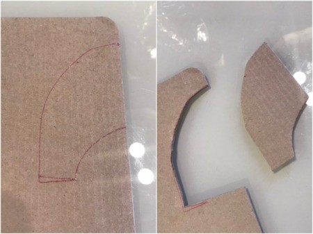 Making a Recycled Rocketship - sketch fins on cardboard and cut out