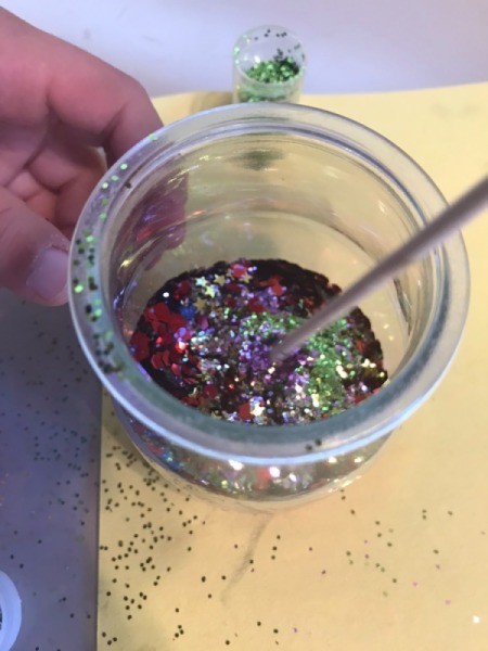 Air Plant with Layered Sand and Glitter - stirring glitter