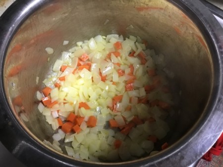 onions and carrots in pot